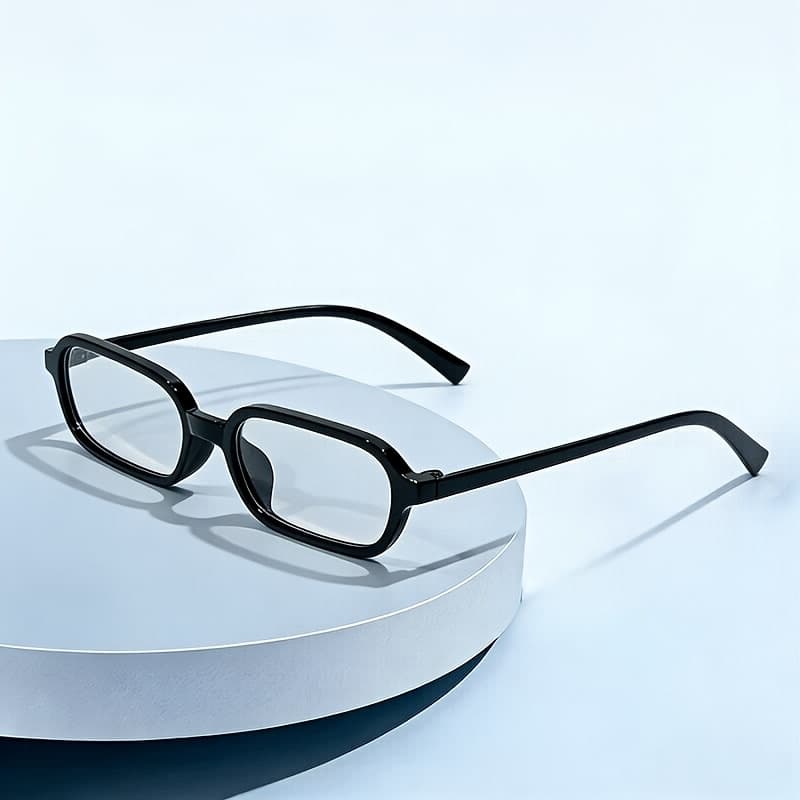 Clear Sleek, Narrow Rectangular Eyeglasses With A Glossy Black Plastic Frame